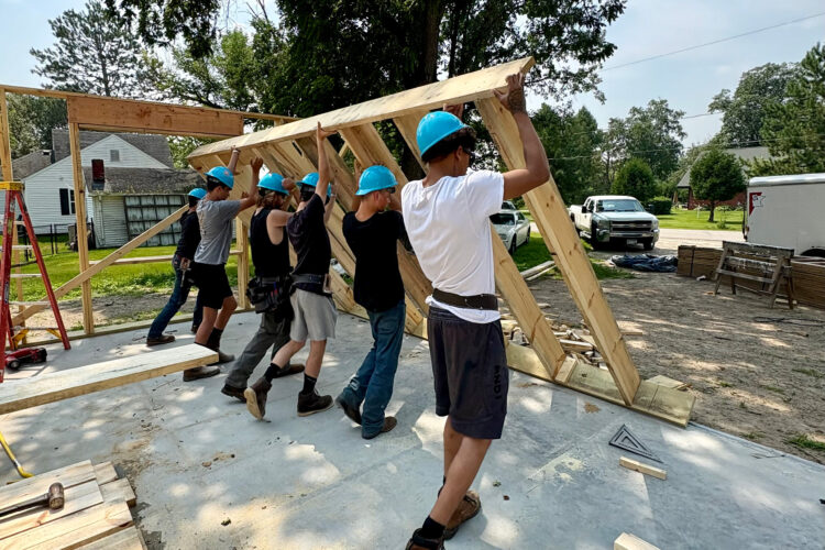 AEOA YouthBuild volunteers help with an Itasca Habitat build